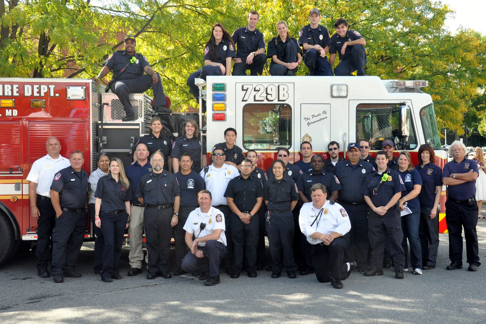 Volunteers in Front of Fire Engine