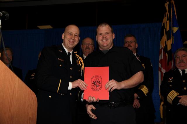 EMT Matt Hermanson receives his certificate for EMT-B